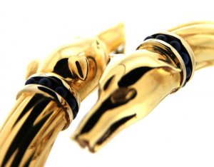 18kt yellow gold rigid bracelet with heads of greyhounds