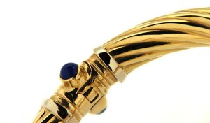 18kt yellow gold rigid bracelet with heads of greyhounds