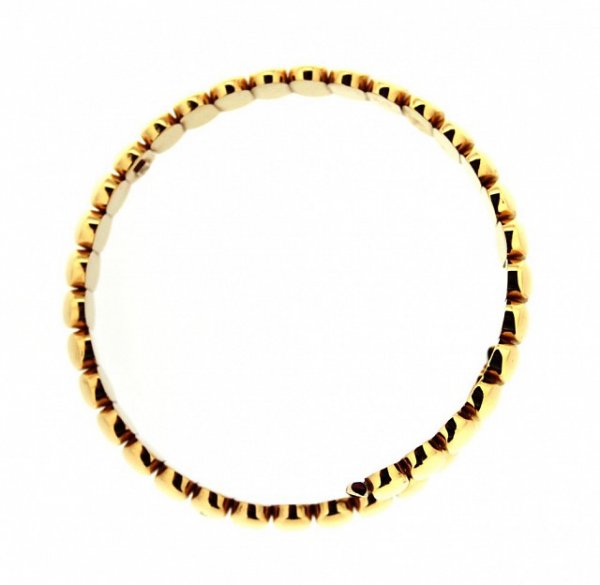 Bracciale rigido in oro giallo con ovalini lucidi